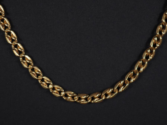 Vente aux enchères Giletière en or jaune 750, maille gourmette fantaisie.  Long. 41 cm Po