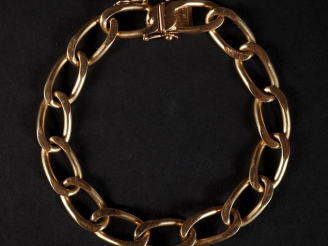 Vente aux enchères Bracelet en or jaune 750, maille gourmette. Long. 20,9 cm Poids. 37,57