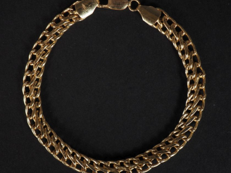 Vente aux enchères Bracelet souple en or jaune 750, maille tressée ajourée. Long. 19 cm P