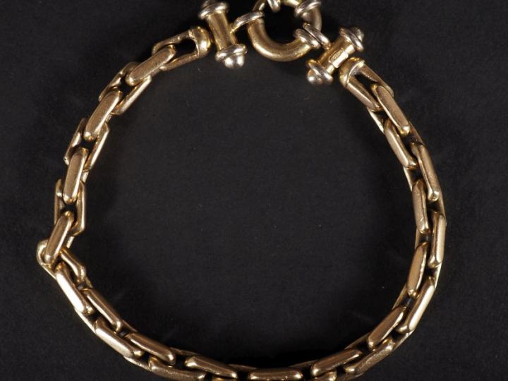 Bracelet en or jaune 750, maille forçat rectangulaire.  Long. 20 cm Po