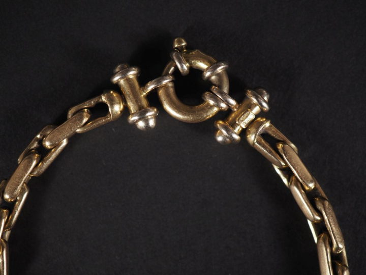 Bracelet en or jaune 750, maille forçat rectangulaire.  Long. 20 cm Po
