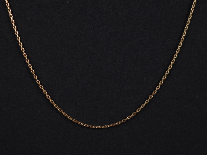 Elément de chaine or jaune 750, maille forçat.  Long. 42,5 cm Poids. 1