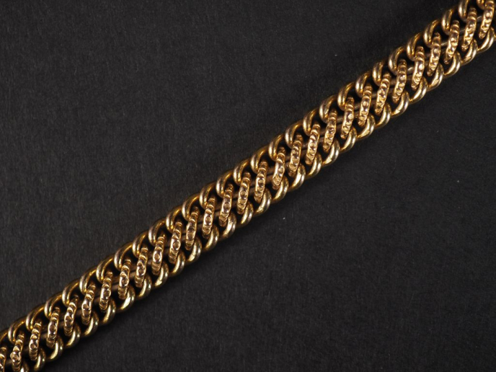 Bracelet souple en plaqué or, maille américaine.  Long. 17,5 cm