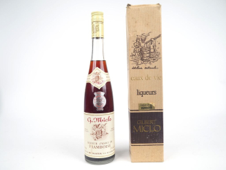 Vente aux enchères 1 BOUTEILLE LIQUEUR DE FRAMBOISE GILBERT MICLO