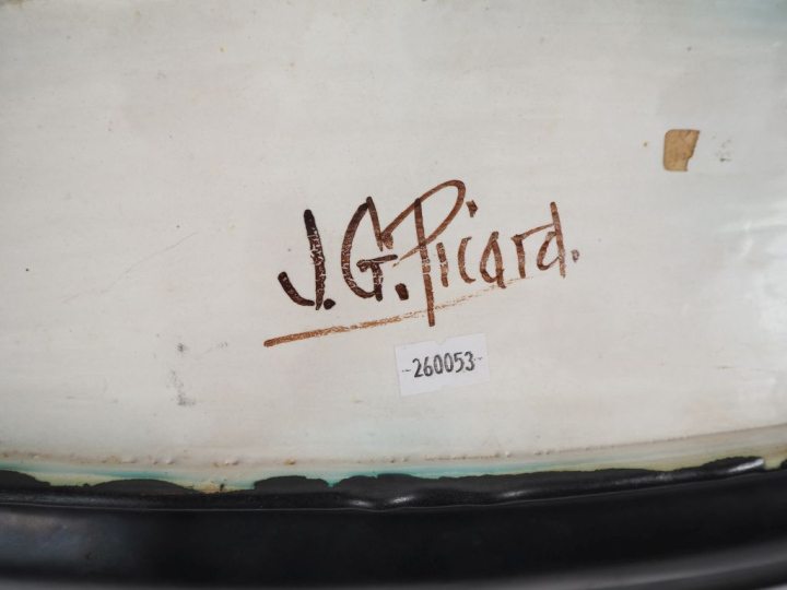 J. G. PICARD.  Plat ovale en céramique flammée polychrome.  (égrenures