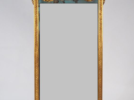 Console demi-lune et glace trumeau de style Louis XVI en bois sculpté 