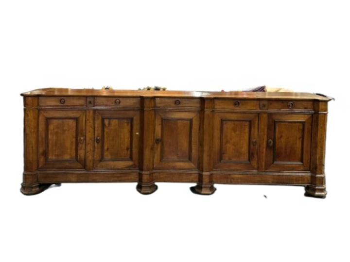 Grande enfilade Restauration en merisier, ouvrant à cinq portes et cin
