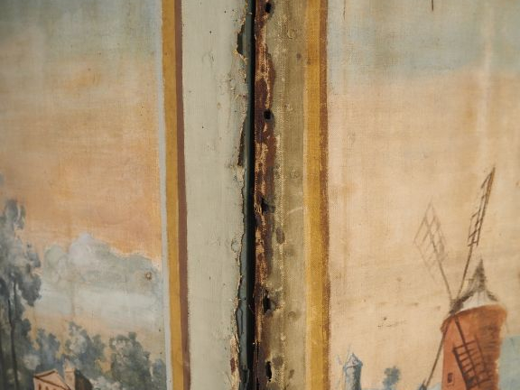 Paravent en toile peinte de style Louis XV à décor de paysage, cinq br