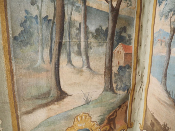Paravent en toile peinte de style Louis XV à décor de paysage, cinq br