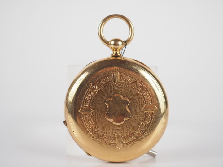 Montre de gousset Napoléon III en or jaune 750.  Cadran rond à chiffre