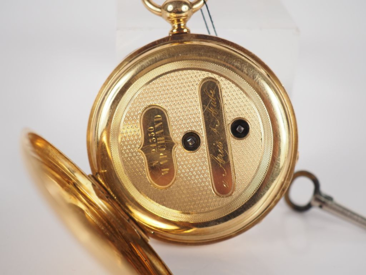 Montre de gousset Napoléon III en or jaune 750.  Cadran rond à chiffre