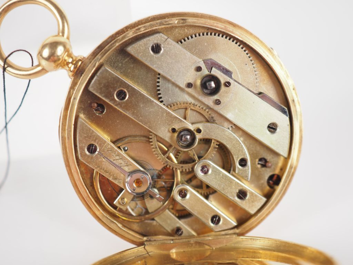 Montre de gousset Napoléon III en or jaune 750.  Cadran rond à chiffre