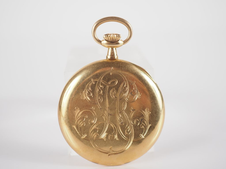 Montre de gousset en or jaune 750.  Cadran à chiffres arabes pour les 