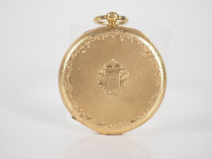 Montre de gousset en or jaune 750.  Cadran à chiffres romains pour les