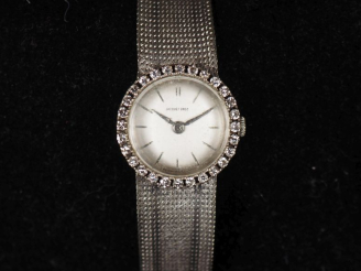 Vente aux enchères JACQUET DROZ Montre bracelet de dame, boitier et bracelet en or blanc 