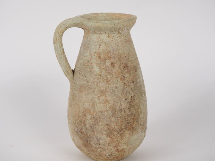 Céramique romaine. Cruche piriforme en céramique beige. 18 cm Expert :