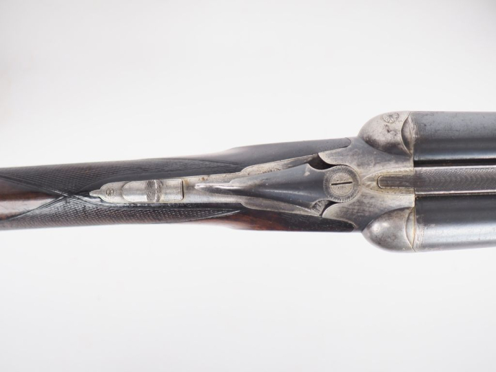 Fusil Juxtaposé calibre 12/65 vendu par "Roland Arquebusier à Albi". B