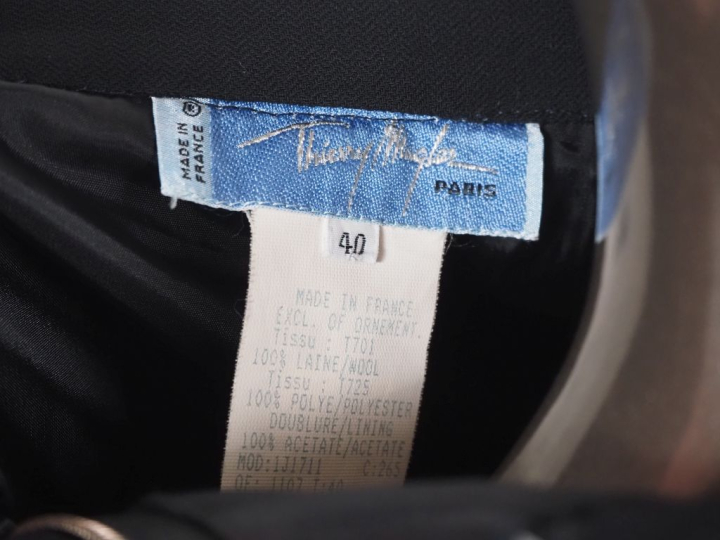 Thierry MUGLER, Paris Jupe en laine (100%) noire.  Fermeture par zip, 