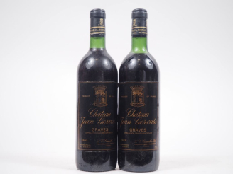Vente aux enchères 2 BOUTEILLES CHÂTEAU JEAN GERVAIS GRAVES - 1982 - 1 LB 