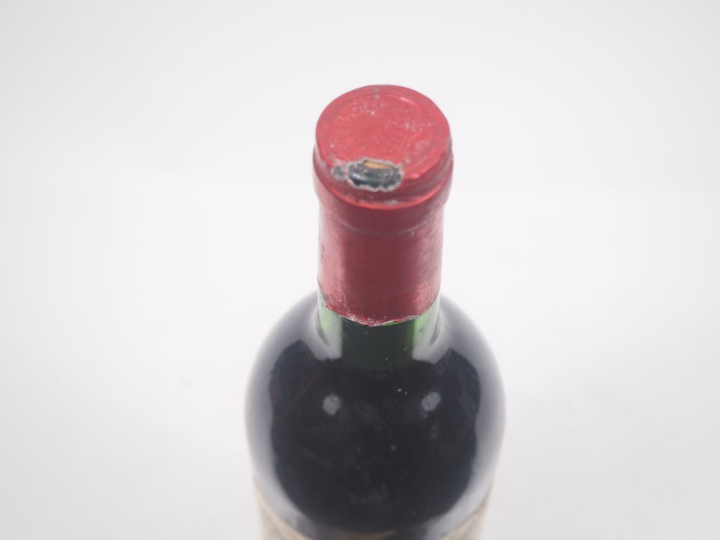 1 BOUTEILLE PETRUS POMEROL - 1983 - ES/CAPS ABIMÉE 