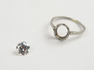 Vente aux enchères Diamant sur papier de 0,66 carat (avec sa monture de bague)