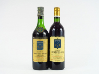 Vente aux enchères 2 BOUTEILLES CHÂTEAU SMITH HAUT LAFITTE GRAVES : 1 de 1973 6 CM/1 de 1
