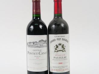 Vente aux enchères 2 BOUTEILLES GCC PAUILLAC : 1 CHÂTEAU GRAND PUY DUCASSE 2000 - 1 CHÂTE