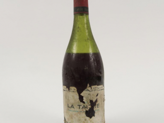 Vente aux enchères 1 BOUTEILLE LA TACHE DOMAINE DE LA ROMANEE CONTI - 1950 - 8 CM/ETA/CAP