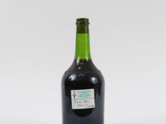 Vente aux enchères 1 VIEILLE BOUTEILLE EAU DE NOIX MISE DU DR ENJALBERT