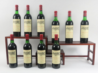 Vente aux enchères 10 BOUTEILLES CHÂTEAU CALON SEGUR GCC ST ESTEPHE - 1976 - CBO - 1 BG/2