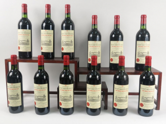 Vente aux enchères 12 BOUTEILLES CHÂTEAU GRAND CORBIN DESPAGNE GCC ST EMILION - 1983 - CB
