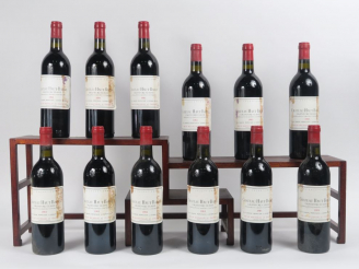 Vente aux enchères 12 BOUTEILLES CHÂTEAU HAUT BAILLY GCC GRAVES - 1983 - CBO - BG ++/ELT