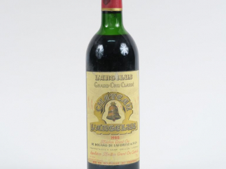 Vente aux enchères 1 BOUTEILLE CHÂTEAU L'ANGELUS GCC ST EMILION - 1985 - HEP/ETLA