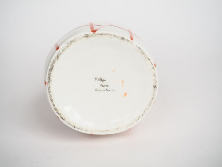 ROBJ. Bouteille à liqueur en porcelaine polychrome "Joueur de cornemus