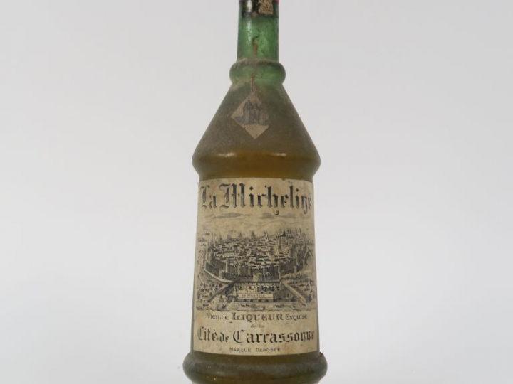 1 TRÈS VIEILLE BOUTEILLE LA MICHELINE 'VIEILLE LIQUEUR EXQUISE DE LA C