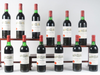 Vente aux enchères 12 BOUTEILLES CHÂTEAU PAVIE 1er GCC ST EMILION - 1976 - CBO - 2 BG/7 L