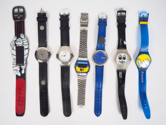 Vente aux enchères MICHELIN.  Lot 6 montres Bibendum et un bracelet.