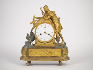 Vente aux enchères Pendule fin XVIIIème - début XIXème en bronze à patine brune et doré à