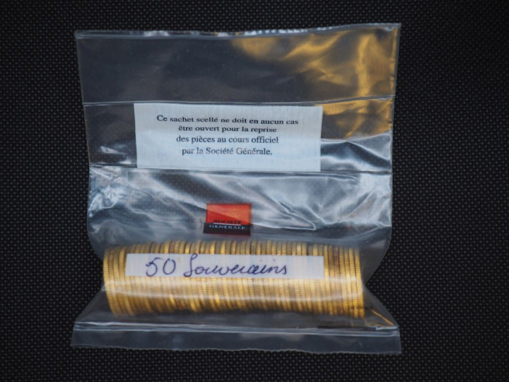 50 souverains or (une date visible 1911) Dans un sachet sous scellé de