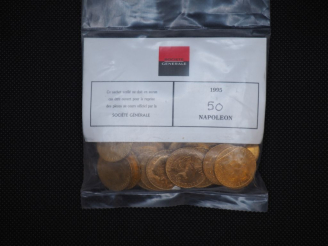 Vente aux enchères 50 pièces de 20 Francs or (dates visibles 1912, 1906) Dans un sachet s