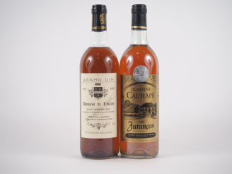 Vente aux enchères 2 BOUTEILLES : 1 JURANCON DOMAINE CAUHAPÉ 1982 - 1 HAUT MONTRAVEL DOMA