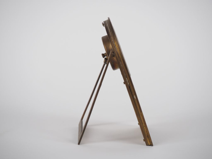 Pendule calendrier Art Déco en bronze.