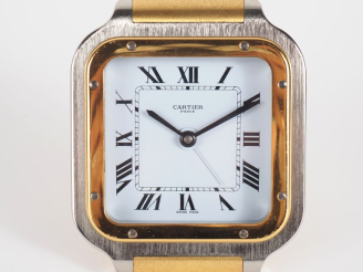 Vente aux enchères CARTIER, SANTOS Pendulette de table / réveil en acier et métal doré.  