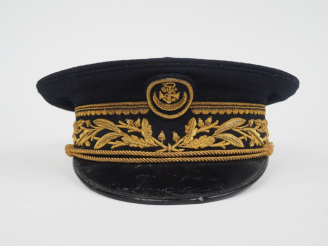 Vente aux enchères Casquette d’administrateur des colonies.  En drap bleu national, brodé