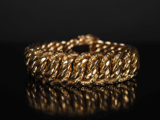 Vente aux enchères Bracelet articulé en or jaune 750, maille américaine.  Chainette de sé