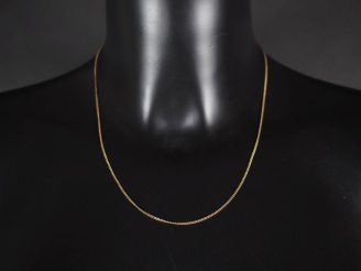 Vente aux enchères Chaine en or jaune 750, maille gourmette.  Long. 46,5 cm Poids. 2,76 g