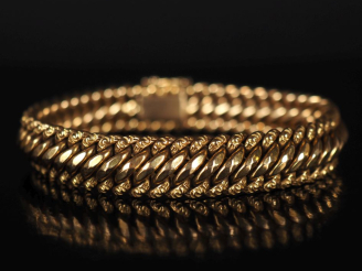 Vente aux enchères Bracelet souple en or jaune 750, maille américaine.  Larg. 1,1 cm Long