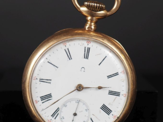 Vente aux enchères OMEGA Montre de gousset en or jaune 750.  Cadran à chiffres romains po