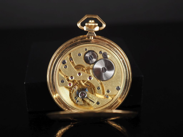 UTI Montre de gousset savonnette en or 750.  Cadran à chiffres arabes 