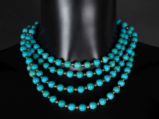 Vente aux enchères Ravissant collier draperie en or jaune 750, composé de quatre rangs de
